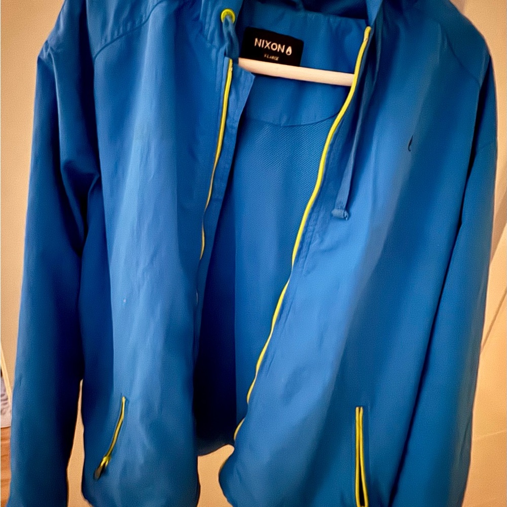 Nixon Blue Windbreaker with Neon Zipper and Stand-Up Collar